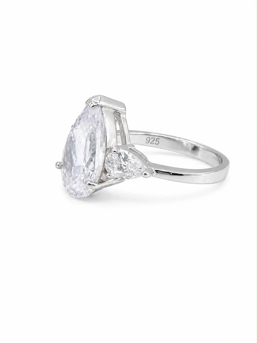 Pear-Shaped White Stone Three-Stone Ring in Silver Tone
